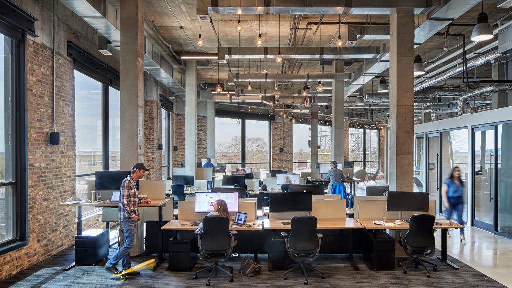 A group of people in an office.